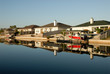Houses waterside on Padre Island, southern Texas USA