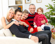 Portrait of a family sitting together at christmas