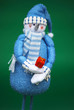 Blue snowman with gift