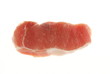Boneless pork steak or pork chop on white
