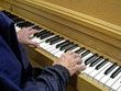 closeup on a woman hands playing piano