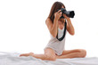 Young attractive woman shooting.