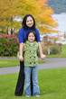 Mother and daughter pose for photo shoots in the park
