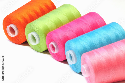 Group of colorful spool of sewing threads
