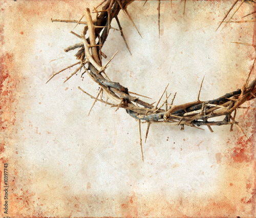Photo: Crown of thorns on a grunge background. Crown of thorns on a grunge background.
