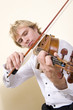 Professional violinists performing as part of a string quartet. Professional violinists performing as part of a string quartet.