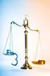 Wooden justice gavel and block with brass