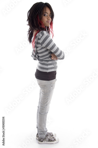 Photo: side pose of punk teenager on an isolated white background side pose of punk teenager on an isolated white background