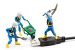 computer repair concept - usb cable repaired by workers isolated computer repair concept - usb cable repaired by workers isolated