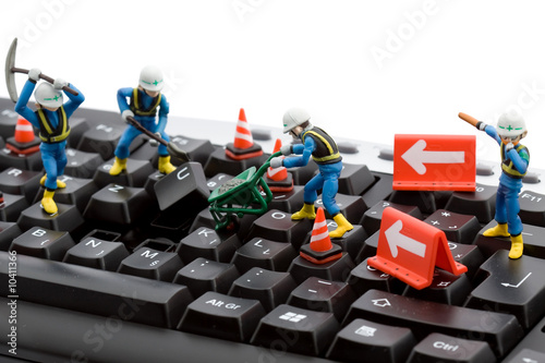  Repair on Computer Repair Concept   Workers Repairing Keyboard    Dinostock