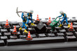 computer repair concept - workers repairing keyboard computer repair concept - workers repairing keyboard