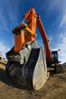 Photo: Big orange backhoe shot with fisheye. Big orange backhoe shot with fisheye.