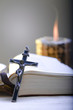 Old Cross and the Holy Bible laying on the table