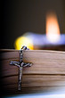 Old Cross and the Holy Bible laying on the table