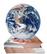 Earth on a magazines pile