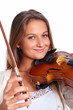 Pretty young woman playing her violin