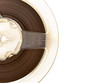 old music bobbin against the white background