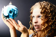 Foto: girl with a magic New Year's sphere girl with a magic New Year's sphere