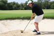 Golfspieler im Bunker