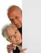 man & woman holding a blank over white background