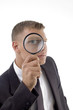 handsome service provider with magnified eye white background handsome service provider with magnified eye white background