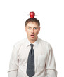 businessman with apple on the head