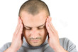 Young man with migraine isolated on white