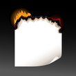A piece of burning paper with jagged edges
