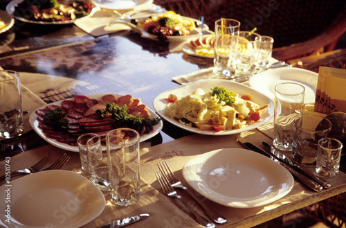 Photo: Ukraine, Odessa, table setting at restaurant, close-up Ukraine, Odessa, table setting at restaurant, close-up