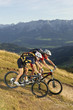 Austria, Tirol, couple riding bicycle