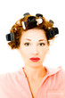 beautiful girl in hair curlers. Isolation