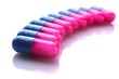 Pink and blue capsules