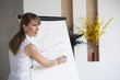 Business woman writing on flipchart