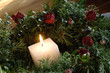Burning candle in chaplet