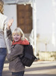 Mother bringing boy to school