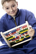 Boy holding slide rule