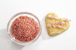 Heart-shaped biscuit with sugar pealrs