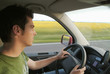 Man driving car, side view