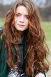 The young beautiful girl with magnificent hair