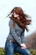 The young beautiful girl with magnificent hair