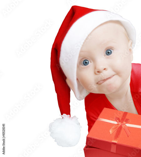 funny hat. funny baby in Santa hat with
