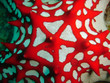 A pointy red and white starfish