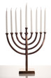 Beautiful unlit hanukkah menorah on white table.