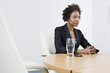Businesswoman with Hands Clasped