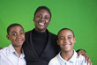 A woman with two boys who appear to be her children.
