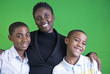 A young African American mother and her two young boys.