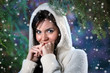 Beautiful young woman in winter forest. Shallow DOF.