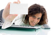 female showing her business card on  white background