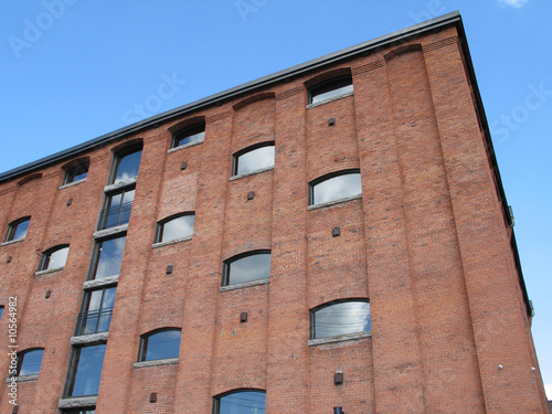 Photo: old industrial brick building old industrial brick building