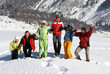 Jumping friends in winter mountain